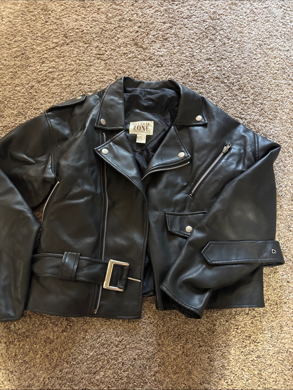 Not real leather moto  -this is perfect for a Grease look for Halloween’